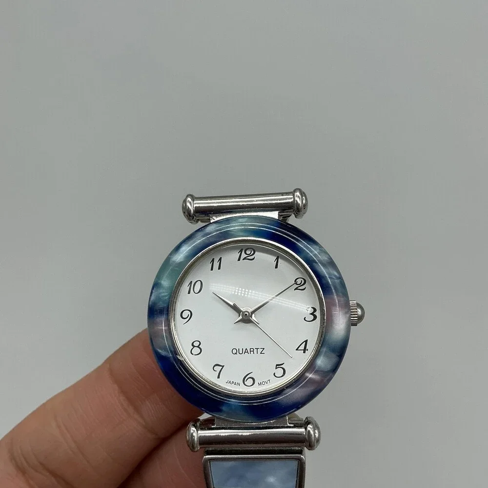Avon Womens Watch 28mm Blue Abalone Bezel Inlay Stretch F69038-1/P New Battery